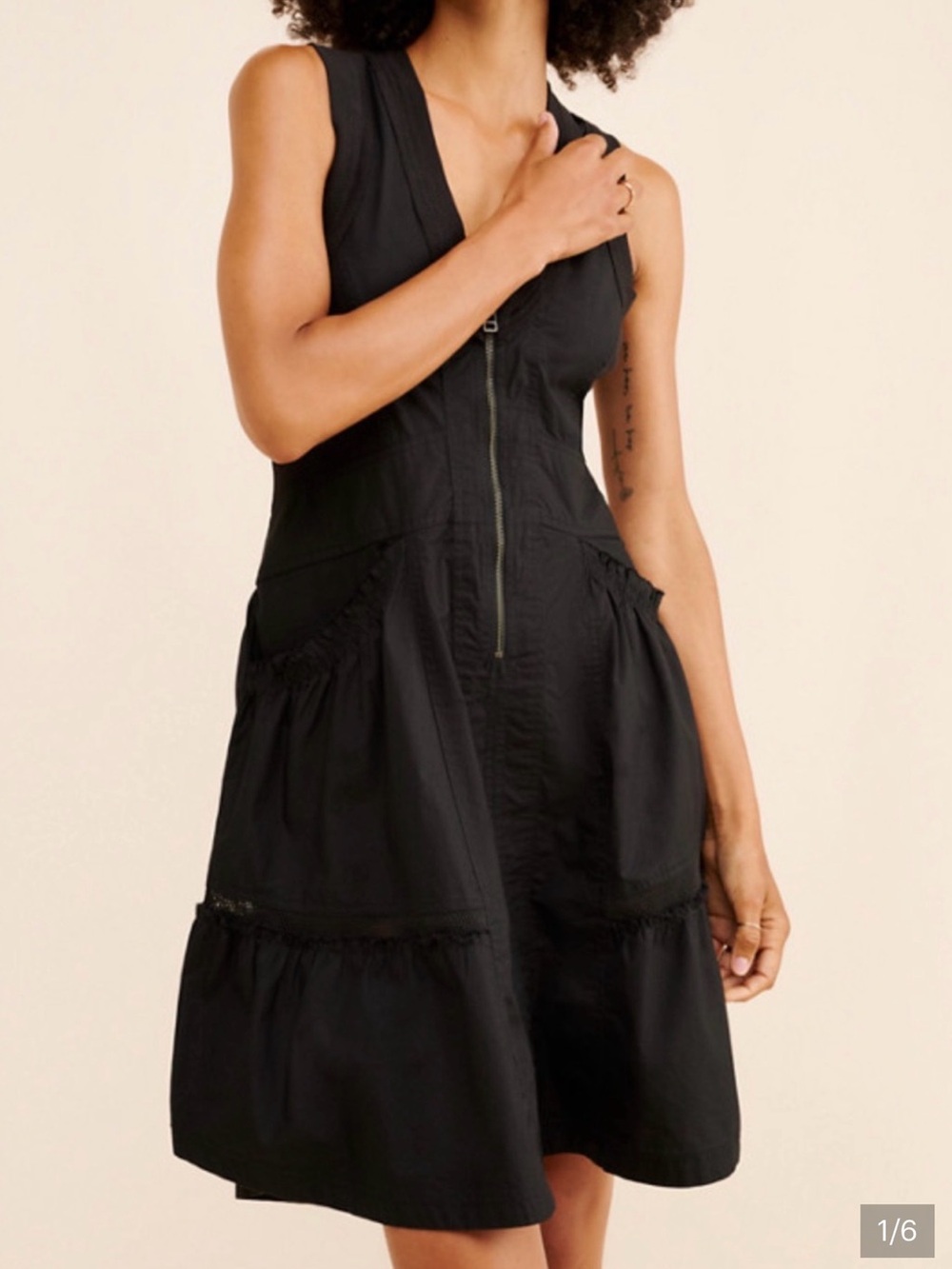 Sleeveless Black Zip-Front Mini Dress with Pocket Detail